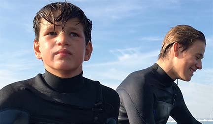 boys wearing O'Neill wet suits